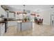 Bright kitchen with stainless steel appliances, granite countertops, and an island at 5628 Marion Circle, Myrtle Beach, SC 29577