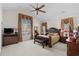 Spacious main bedroom showcasing a luxurious bed, stylish furnishings, and large windows with drapes at 5628 Marion Circle, Myrtle Beach, SC 29577