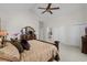 Cozy main bedroom features a comfortable bed, dresser, and easy access to an ensuite bathroom at 5628 Marion Circle, Myrtle Beach, SC 29577