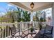 Relaxing balcony seating area with views of lush landscaping at 5751 Oyster Catcher Dr. # 234, North Myrtle Beach, SC 29582