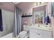 Bathroom featuring a shower-tub, toilet, and vanity with mirror at 5751 Oyster Catcher Dr. # 234, North Myrtle Beach, SC 29582