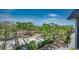 Aerial view of a wooded community with RVs and lush greenery under a blue sky at 5905 S Kings Hwy. # A551, Myrtle Beach, SC 29575