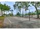 Outdoor community basketball court offers a space for sports and recreation surrounded by green trees and parking at 5905 S Kings Hwy. # A551, Myrtle Beach, SC 29575