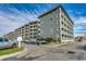 Exterior view of condominiums with private balconies and convenient parking at 5905 S Kings Hwy. # A551, Myrtle Beach, SC 29575