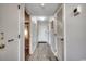 Hallway with hardwood floors, white walls, doors and a closet at 5905 S Kings Hwy. # A551, Myrtle Beach, SC 29575