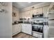 Kitchen boasts stainless steel appliances, plenty of counter space, and hardwood floors at 5905 S Kings Hwy. # A551, Myrtle Beach, SC 29575