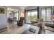 Comfortable living room with balcony view, hardwood floors, and stylish furniture at 5905 S Kings Hwy. # A551, Myrtle Beach, SC 29575