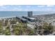 Wide aerial view of a beachfront resort showcasing its pools, multiple buildings, RV park, and beach access at 5905 South Kings Hwy. # 132-A, Myrtle Beach, SC 29575