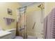 Cozy bathroom with a shower and tub, a vanity with storage, and beach-themed decor for a relaxing experience at 5905 South Kings Hwy. # 132-A, Myrtle Beach, SC 29575