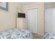 Bright bedroom featuring a dresser with TV and closet at 5905 South Kings Hwy. # 132-A, Myrtle Beach, SC 29575