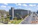 Beautiful condo complex showcasing multiple levels, manicured landscaping, ample parking, and convenient beach access at 5905 South Kings Hwy. # 132-A, Myrtle Beach, SC 29575