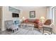 The charming living room features comfy chairs, sofa, and tv at 5905 South Kings Hwy. # 132-A, Myrtle Beach, SC 29575