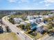 Aerial view of a residential area featuring multiple colorful houses and lush greenery at 600 Hillside Dr. S, North Myrtle Beach, SC 29582