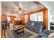 Open-concept living room flowing into dining area and kitchen, featuring comfortable seating at 600 Hillside Dr. S, North Myrtle Beach, SC 29582