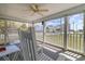 Charming porch with rocking chairs, a ceiling fan and great views of the neighborhood at 600 Hillside Dr. S, North Myrtle Beach, SC 29582