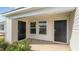 Covered front porch with dual entry doors, offering an inviting entrance with great curb appeal at 616 Culmen Ct., Myrtle Beach, SC 29588