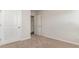 Bedroom with neutral colored carpet and light walls has access to another room at 620 Culmen Ct., Myrtle Beach, SC 29588