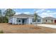 Beautiful home featuring tidy landscaping, light blue siding, and a well-manicured lawn at 620 Culmen Ct., Myrtle Beach, SC 29588
