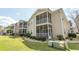 Exterior of condos with lovely screened in porch overlooking the landscaping at 6207 Sweetwater Blvd. # 6207, Murrells Inlet, SC 29576