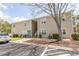 Exterior view of condos on a sunny day with parking nearby and nice walkway at 6207 Sweetwater Blvd. # 6207, Murrells Inlet, SC 29576