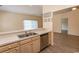 Kitchen with stainless appliances, a breakfast bar, and convenient access to the living area at 6207 Sweetwater Blvd. # 6207, Murrells Inlet, SC 29576