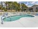 Sparkling community pool surrounded by manicured landscaping at 6207 Sweetwater Blvd. # 6207, Murrells Inlet, SC 29576