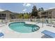 Beautiful community pool with ample seating and lush landscaping at 6207 Sweetwater Blvd. # 6207, Murrells Inlet, SC 29576