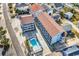 Aerial shot of condo building complex featuring a community pool, in a well-located area at 625 N Waccamaw Dr. # 301, Murrells Inlet, SC 29576