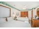A cozy bedroom showcasing two beds, closet space and a nautical themed décor at 625 N Waccamaw Dr. # 301, Murrells Inlet, SC 29576