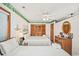 Inviting bedroom showcasing two beds, a dresser, and a closet at 625 N Waccamaw Dr. # 301, Murrells Inlet, SC 29576
