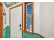 Entryway featuring a decorative door, blue wainscoting and a stained-glass accent window at 625 N Waccamaw Dr. # 301, Murrells Inlet, SC 29576