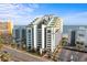 Beautiful exterior of Monterey Bay Suites featuring a parking area, street view, and nearby beach access at 6804 N Ocean Blvd. # 1127, Myrtle Beach, SC 29572