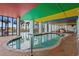 Indoor pool area offering a year-round swimming experience and stylish setting at 6804 N Ocean Blvd. # 1127, Myrtle Beach, SC 29572