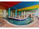 Indoor lazy river with a pedestrian bridge, perfect for relaxing and enjoying time together at 6804 N Ocean Blvd. # 1127, Myrtle Beach, SC 29572