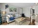 Cozy living room with a comfortable couch, a decorative rug, and stylish decor at 6804 N Ocean Blvd. # 1127, Myrtle Beach, SC 29572