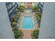Inviting swimming pool and lounging area nestled amidst lush greenery and stylish architecture at 6804 N Ocean Blvd. # 1127, Myrtle Beach, SC 29572