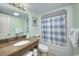 Bright bathroom with granite vanity, ample storage, and a shower tub, perfect for relaxing at 6900 N Ocean Blvd. # 1505, Myrtle Beach, SC 29572