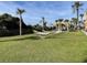 Relax on hammocks surrounded by landscaped grounds and shady palm trees at 6900 N Ocean Blvd. # 1505, Myrtle Beach, SC 29572
