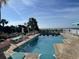 A large rectangular pool and a row of lounge chairs near the ocean at 6900 N Ocean Blvd. # 1505, Myrtle Beach, SC 29572