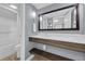 Well lit bathroom with modern sink and fixtures plus walk-in shower with white curtain at 6900 N Ocean Blvd. # 735, Myrtle Beach, SC 29572