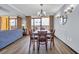 Bright dining area features an open floor plan, wood floors, and access to the balcony at 6900 N Ocean Blvd. # 735, Myrtle Beach, SC 29572