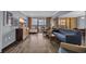 Spacious living room leading to a balcony with ocean views at 6900 N Ocean Blvd. # 735, Myrtle Beach, SC 29572