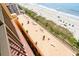 Rooftop sun deck with beach views, lounge chairs, and landscaping at 6900 N Ocean Blvd. # 735, Myrtle Beach, SC 29572