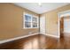 Bright bedroom with hardwood floors, neutral walls, and a built in closet, providing cozy living space at 708 48Th Ave. N, Myrtle Beach, SC 29577