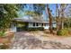 Charming home featuring a carport, mature landscaping, and a welcoming front entrance at 708 48Th Ave. N, Myrtle Beach, SC 29577