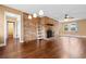 Bright living room with hardwood floors, brick fireplace, and lots of natural light at 708 48Th Ave. N, Myrtle Beach, SC 29577