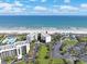 Expansive aerial view showcasing a beachfront condo complex with pristine beach access and ocean views at 741 Retreat Beach Circle # B-1-F, Pawleys Island, SC 29585