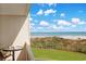 Enjoy the ocean view from this condo's balcony that overlooks lush vegetation and sandy beaches at 741 Retreat Beach Circle # B-1-F, Pawleys Island, SC 29585