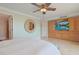 A spacious bedroom features a custom built-in cabinet and a decorative mirror at 741 Retreat Beach Circle # B-1-F, Pawleys Island, SC 29585