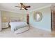 A bright bedroom with stylish furnishings and decor at 741 Retreat Beach Circle # B-1-F, Pawleys Island, SC 29585